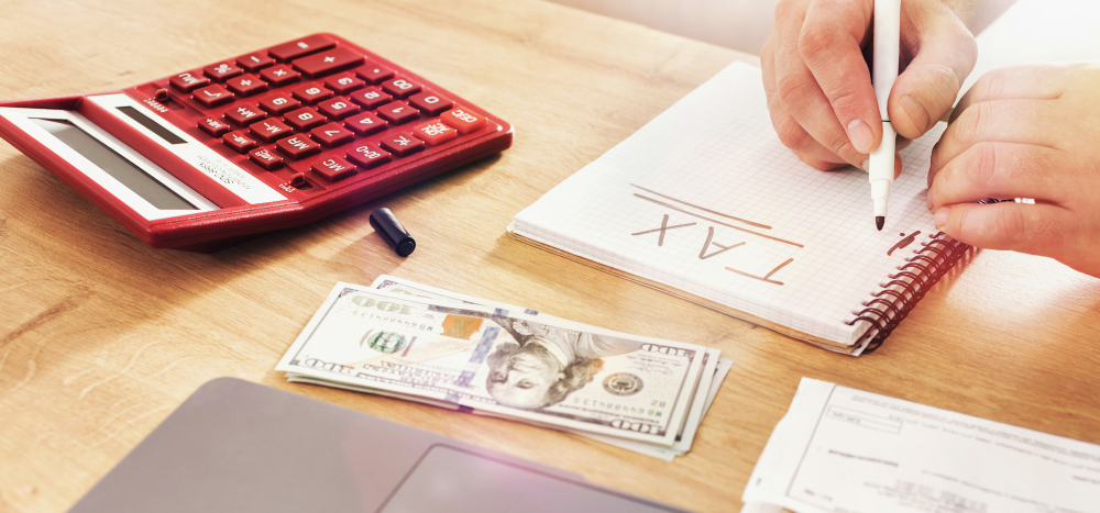 Man writes tax payment plan at home
