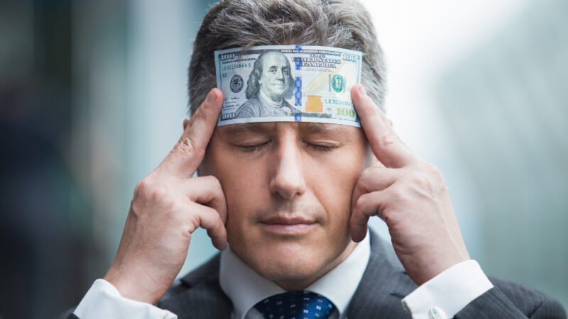 Businessman banknote holding showing business