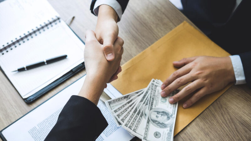 Business colleagues working at desk in office