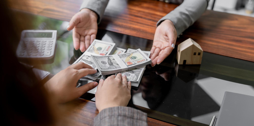 Business people signing contract making deal with real estate agent concept for consultant home insurance real estate investment property insurance security
