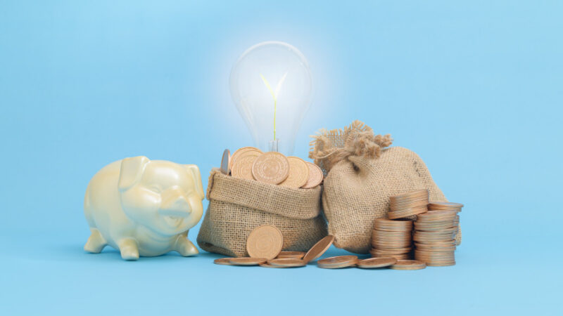 Growing money business finance and saving money investment concept stacking coins