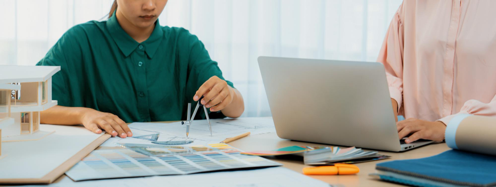 Skilled interior designer team focusing on their performance variegated
