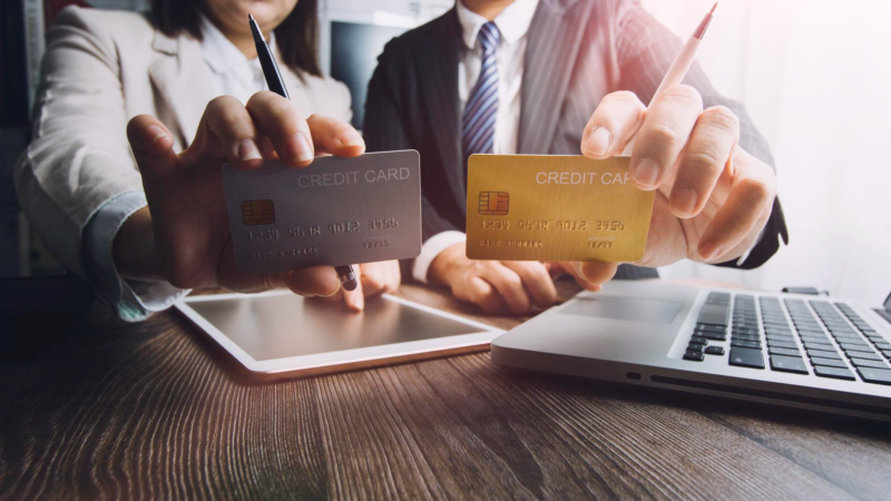Woman hand using mobile smart phone online payment banking and online shopping at the home
