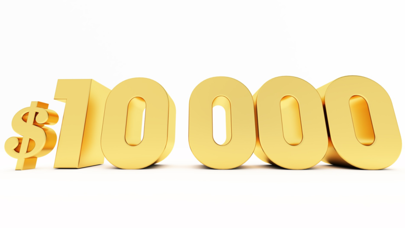 3d render of golden $10000 dollar isolated on white background