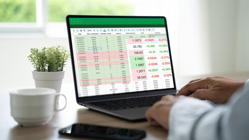 Businessman working with data and graphs in spreadsheet documents for online analysis microsoft excel project dashboard accounting digital